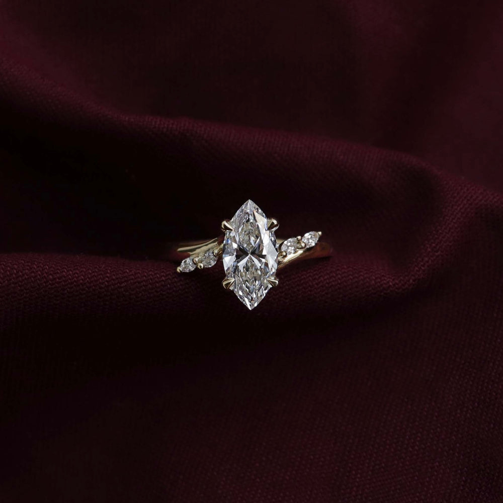 
                      
                        The Amira Ring - Marquise with Marquise Accents
                      
                    