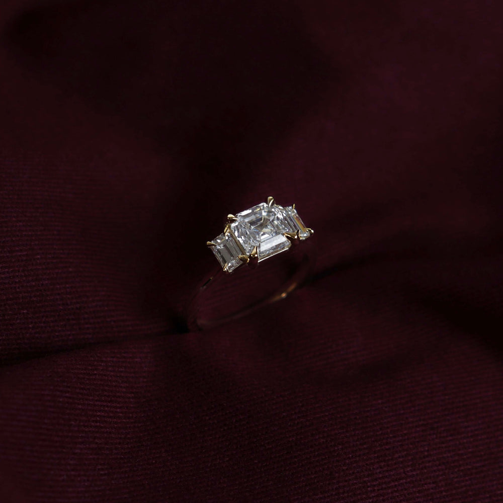 
                      
                        The Neave Ring - Asscher and Baguette Trilogy
                      
                    