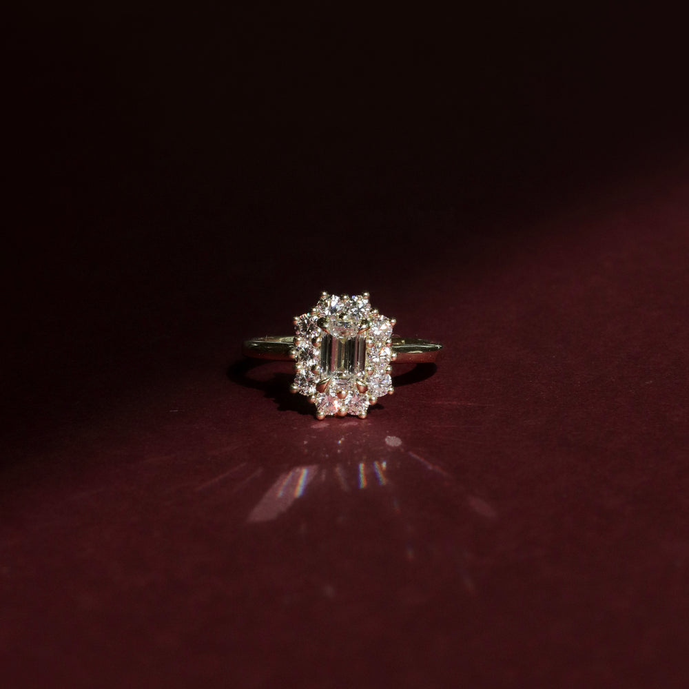 
                      
                        The Eloise Ring - Emerald Antique Halo
                      
                    