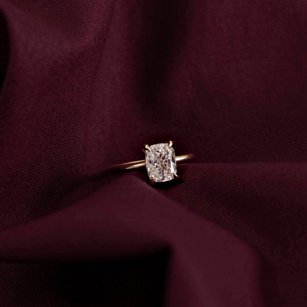 
                      
                        The Ophelia Ring - Elongated Cushion Solitaire
                      
                    