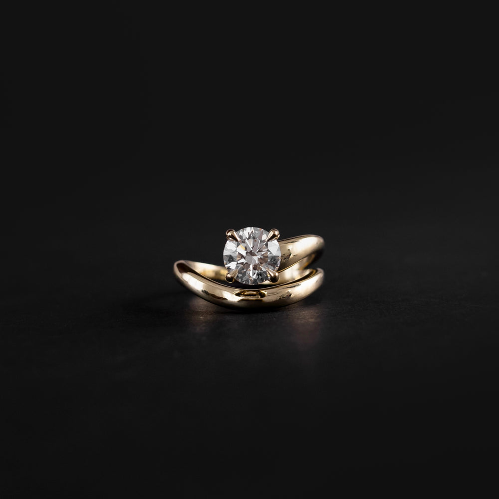 
                      
                        The Adella Ring - Round Brilliant Solitaire with Wrapped Band
                      
                    