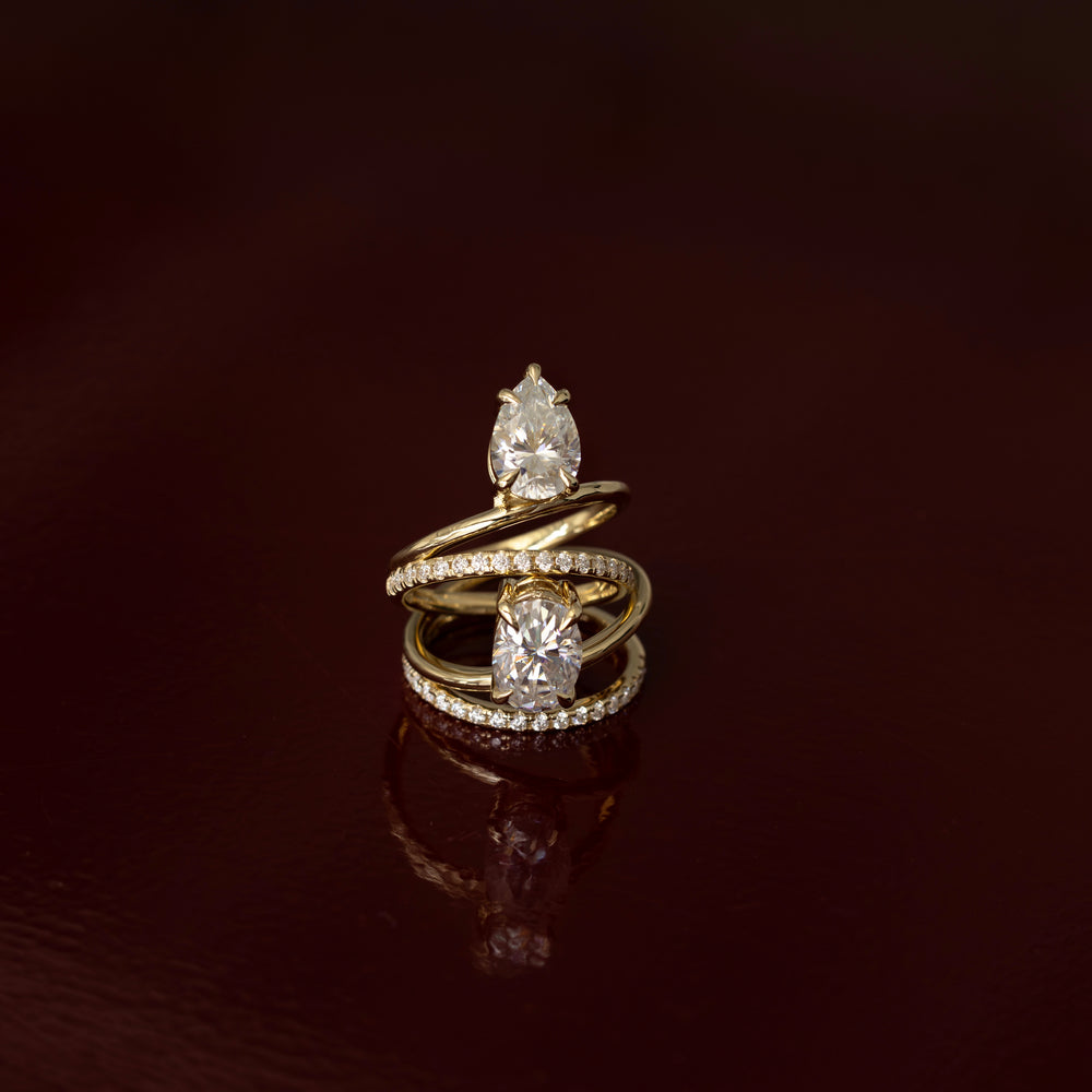 
                      
                        The Emerie Ring - Pear Double Band Solitaire
                      
                    