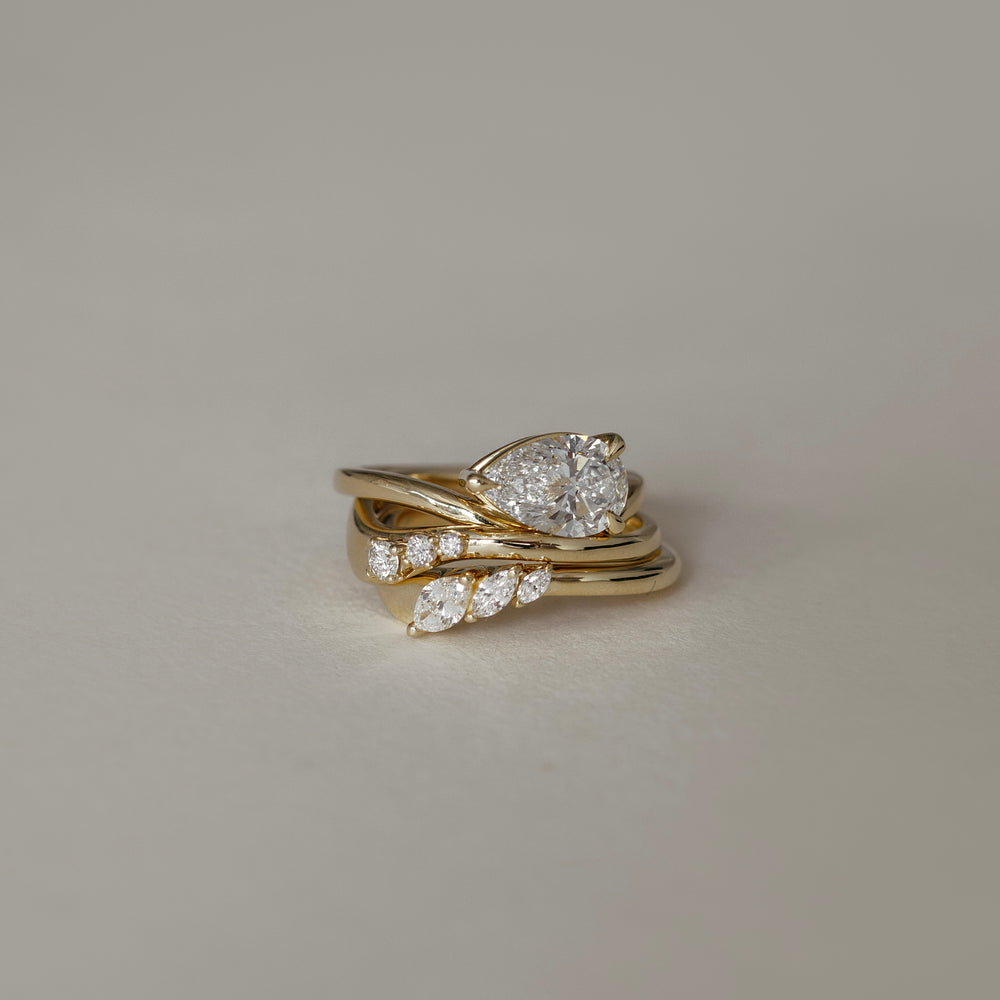 
                      
                        The Maya Ring - Pear Curved Solitaire
                      
                    