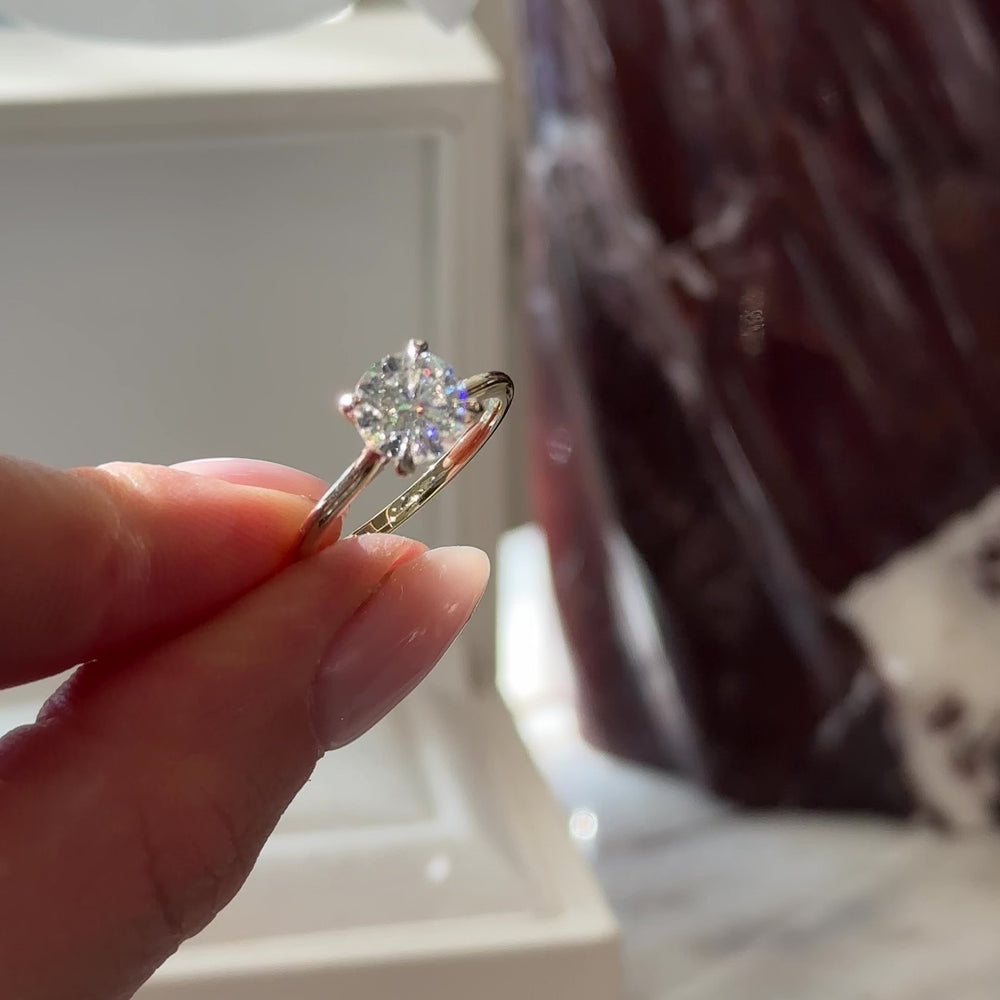 
                      
                        Load and play video in Gallery viewer, The Isla Ring - 1.5ct Round Moissanite Cathedral Solitaire
                      
                    