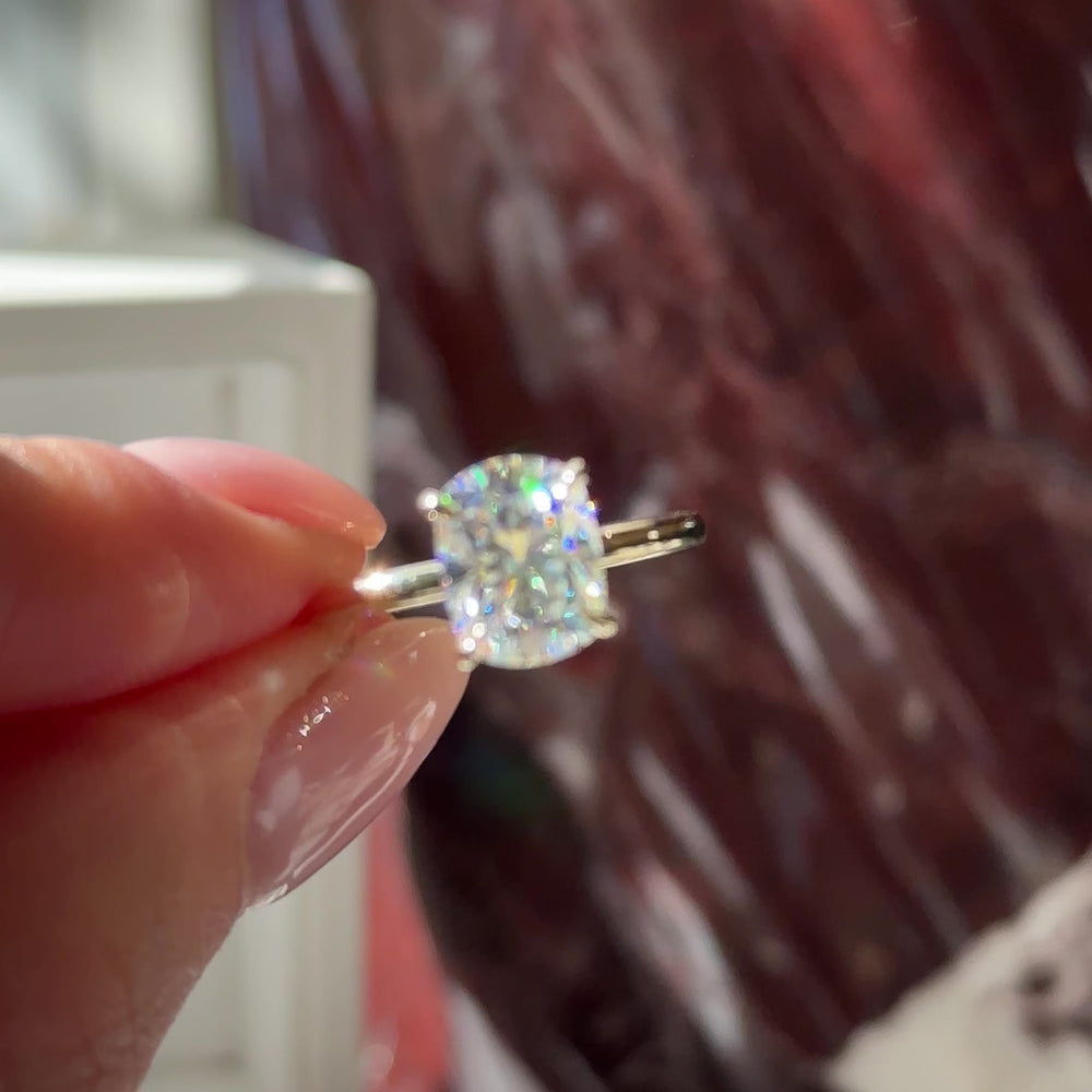 
                      
                        Load and play video in Gallery viewer, The Ophelia Ring - 2.4ct Moissanite Elongated Cushion Solitaire
                      
                    