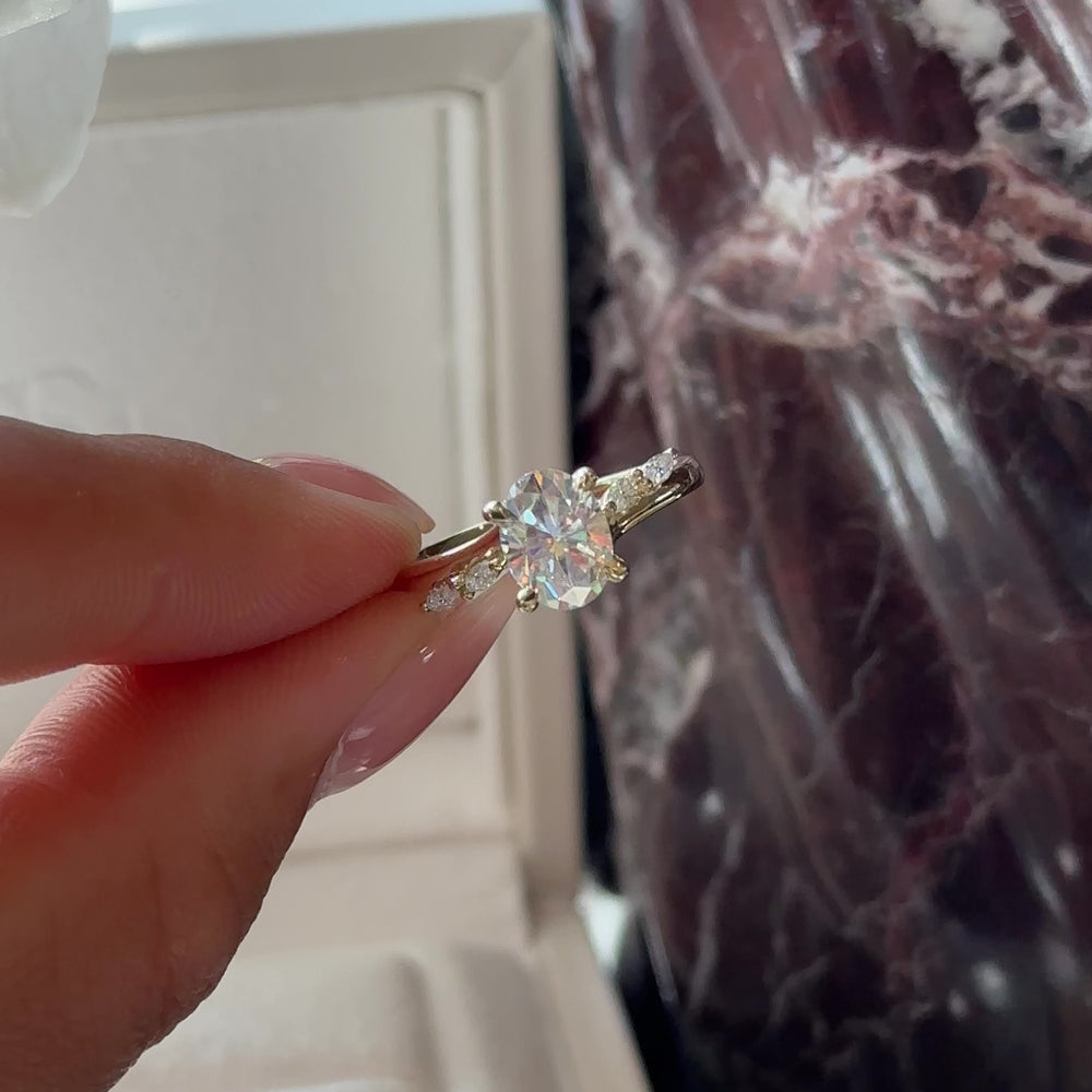 
                      
                        Load and play video in Gallery viewer, The Amira Ring - 1.5ct Moissanite Oval with Marquise Accents
                      
                    