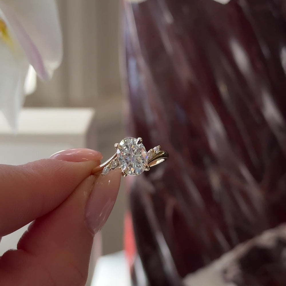 
                      
                        Load and play video in Gallery viewer, The Amira Ring - 2.1ct Moissanite Oval with Marquise Accents
                      
                    