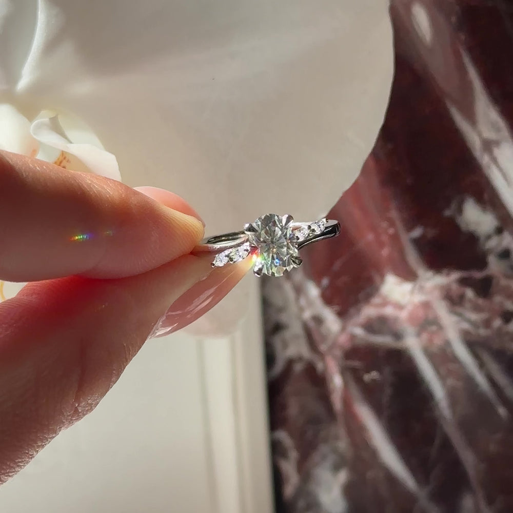 
                      
                        Load and play video in Gallery viewer, The Amira Ring - 1.5ct Moissanite Oval with Marquise Accents
                      
                    