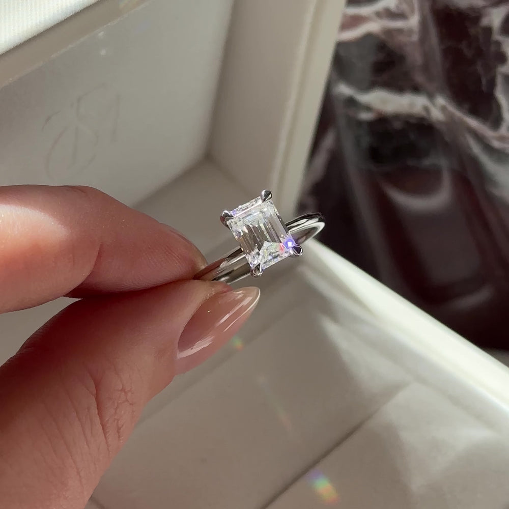 
                      
                        Load and play video in Gallery viewer, The Audrey Ring - 1.9ct Moissanite Emerald Solitaire
                      
                    