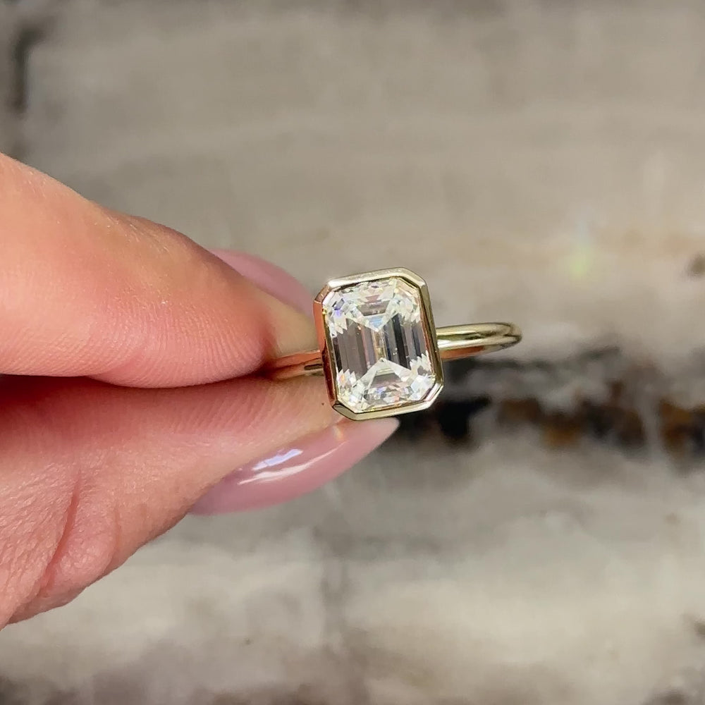 The Audrey Ring - 2.8ct Moissanite Emerald Bezel Solitaire