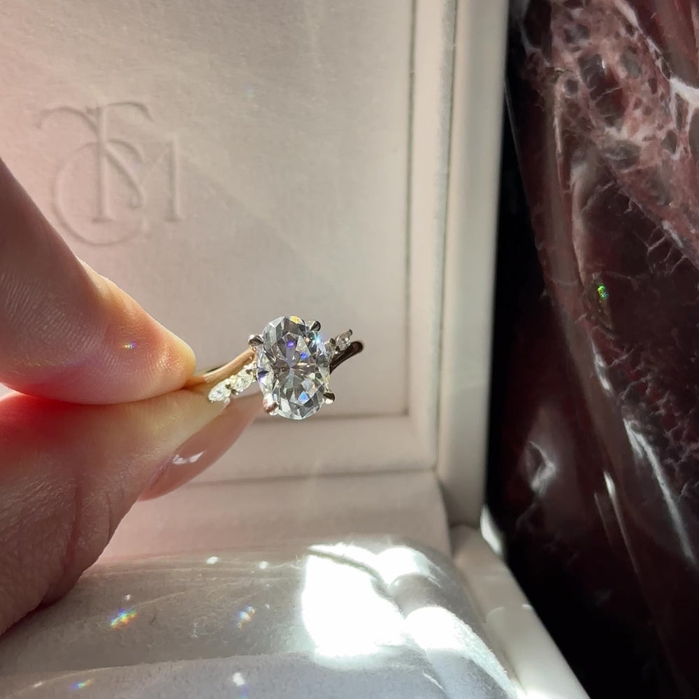 
                      
                        Load and play video in Gallery viewer, The Amira Ring - 2.5ct Moissanite Oval with Marquise Accents
                      
                    