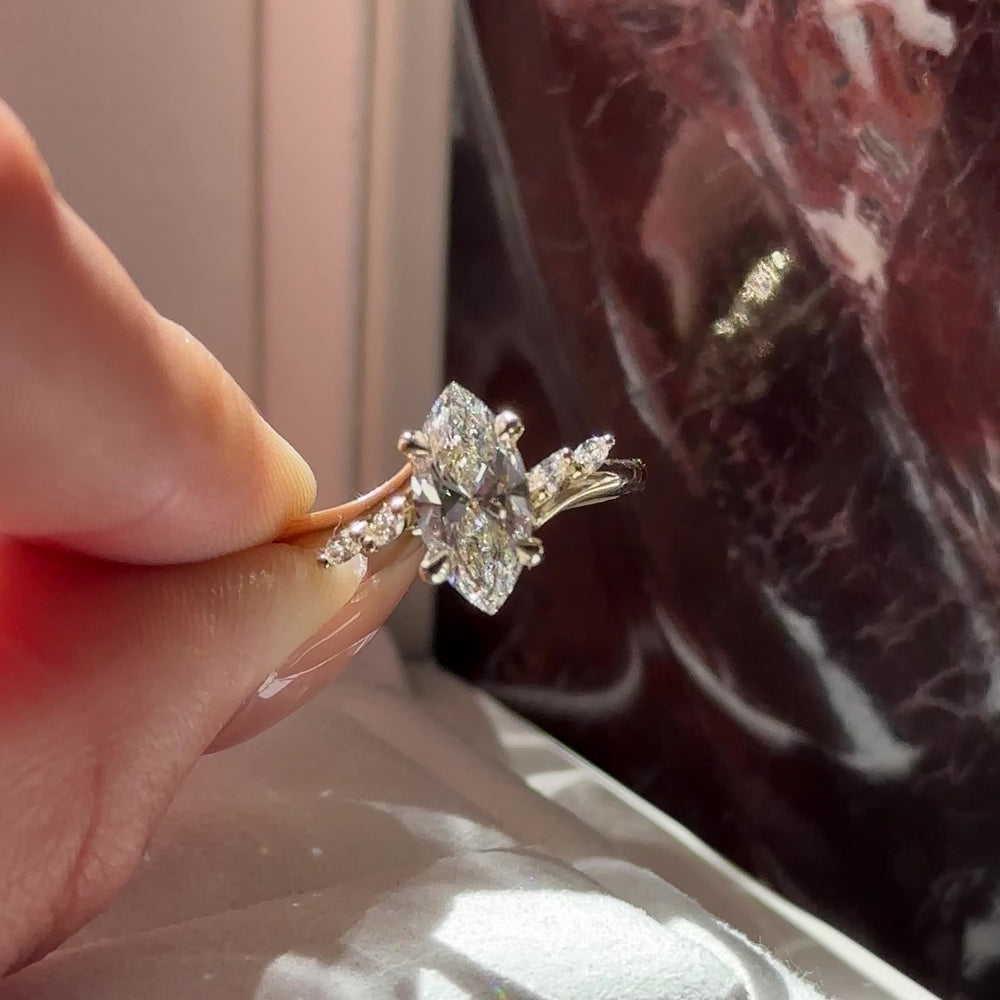 
                      
                        Load and play video in Gallery viewer, The Amira Ring - 1.51ct Lab Grown Diamond Marquise with Marquise Accents
                      
                    