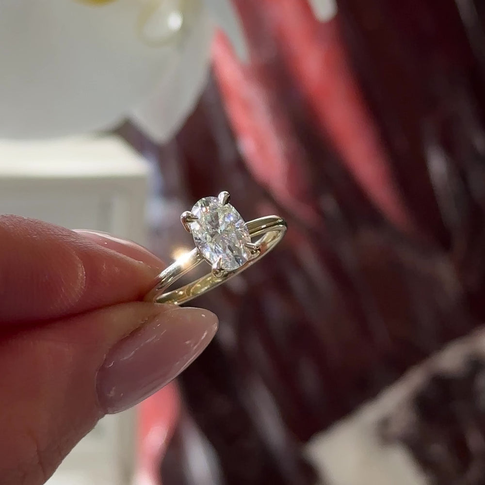 
                      
                        Load and play video in Gallery viewer, The Luise Ring - 1.8ct Moissanite Low Set Oval Solitaire
                      
                    