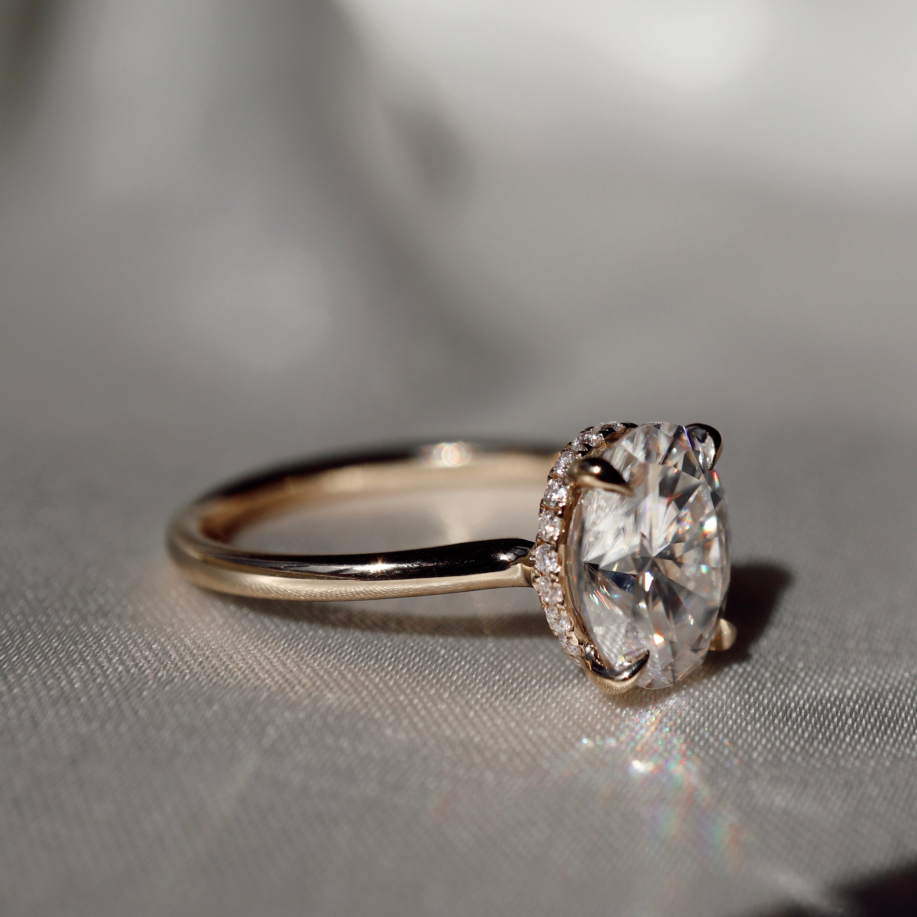 The Luise Ring™ Low Set - Oval Solitaire with Hidden Halo