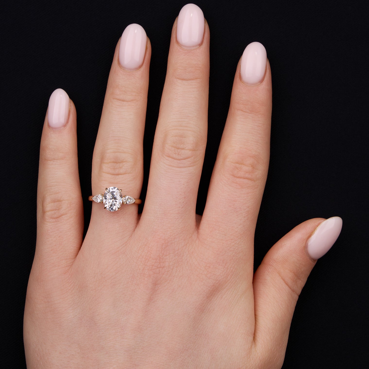 Oval trilogy deals diamond ring